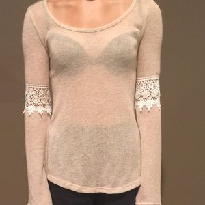 Women's see through top with flowing sleeves